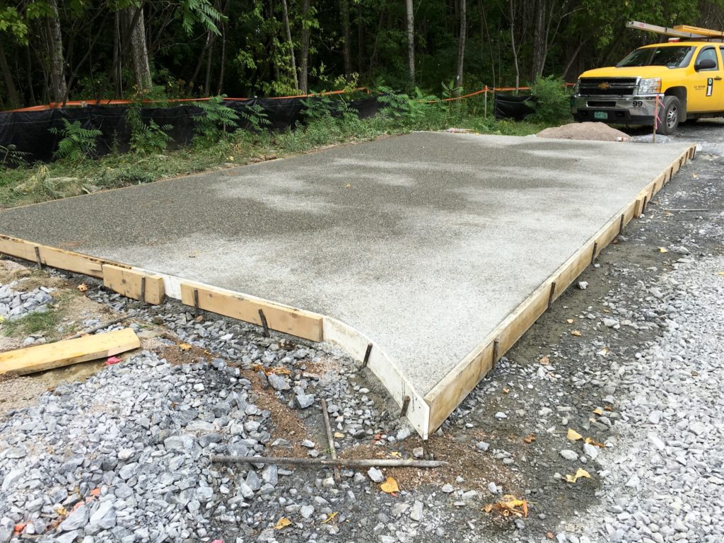 Exposed aggregate concrete pad at Pause Place 1 will house fitness equipment provided by UVM Medical Center and a bike rack .
